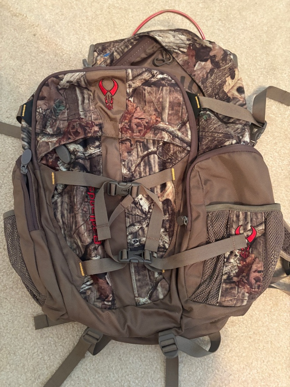 Realtree Camo Daypack Backpack in Brown and Tan with Red Logo